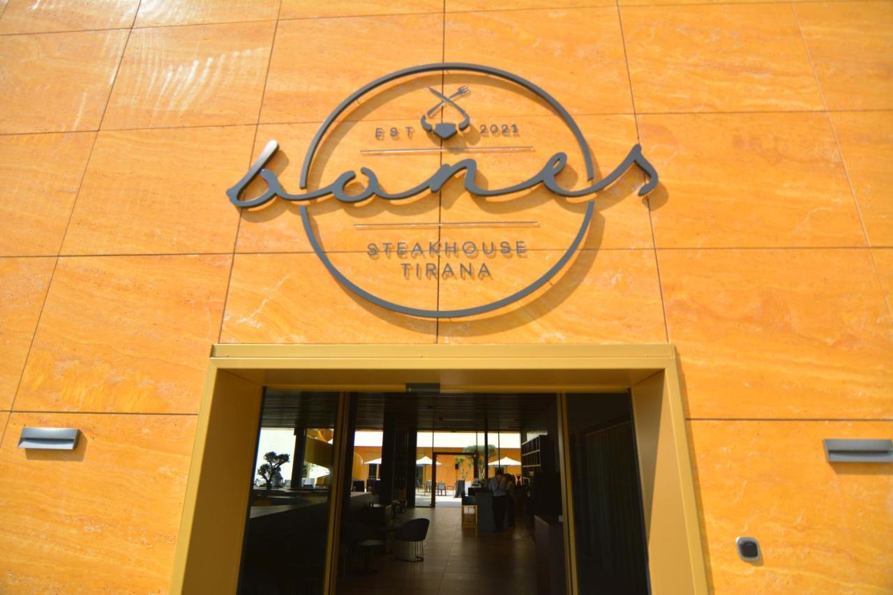 mk hotel tirana Rinas Eksteriør billede Entrance of the restaurant