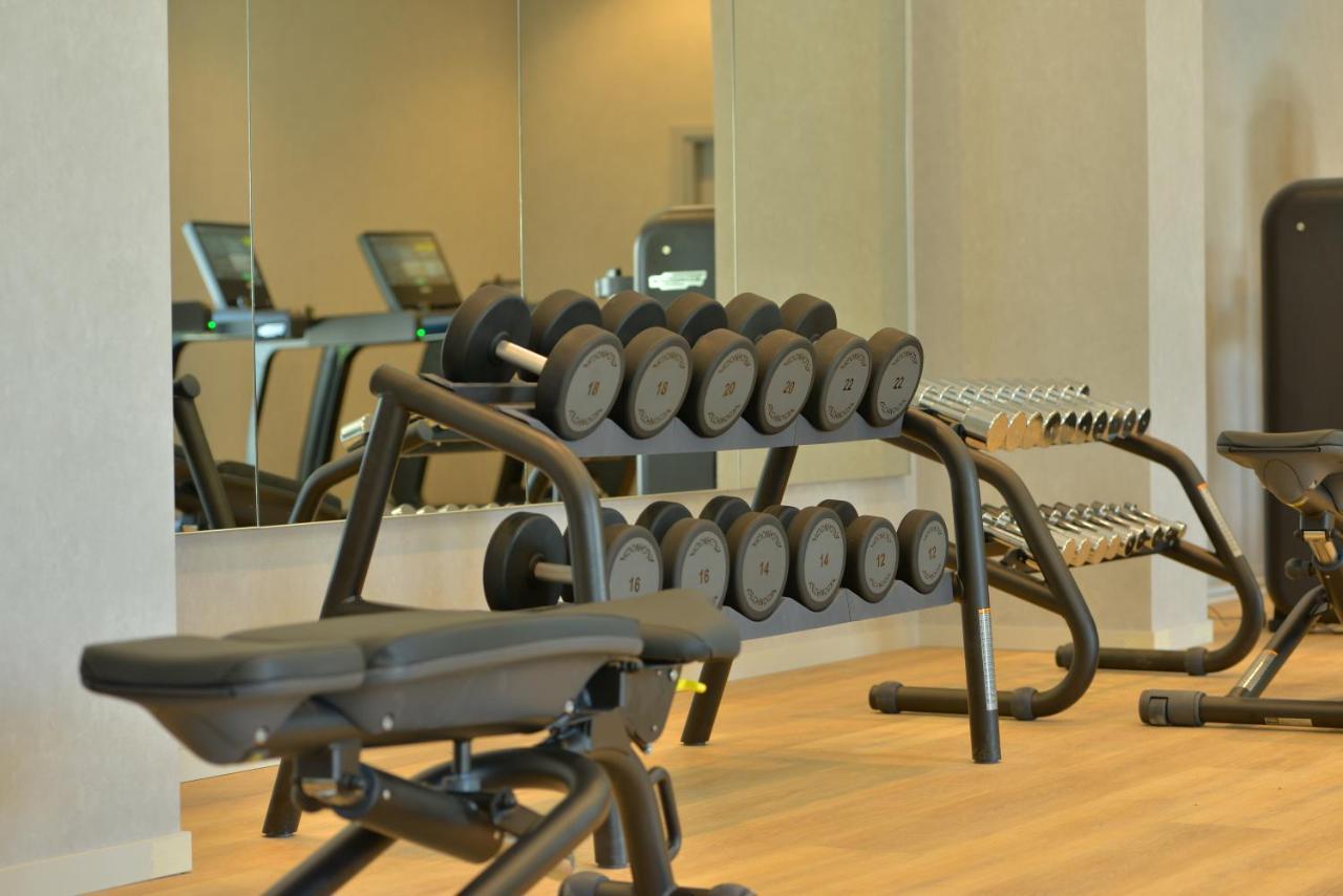 mk hotel tirana Rinas Eksteriør billede Dumbbells
