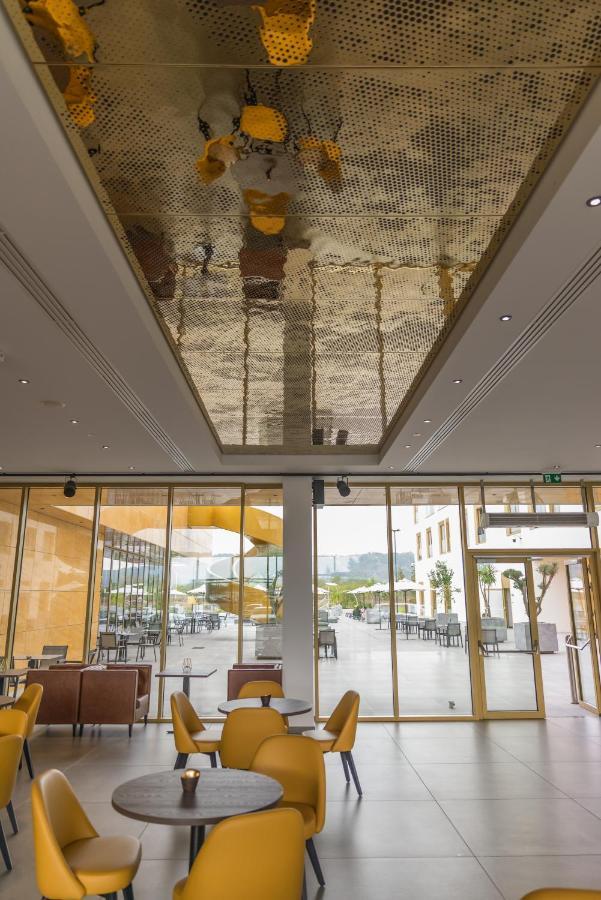 mk hotel tirana Rinas Eksteriør billede The ceiling of the lobby